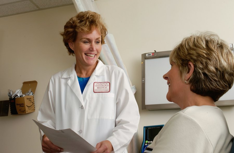 Doctor discussing coverage options with a senior patient